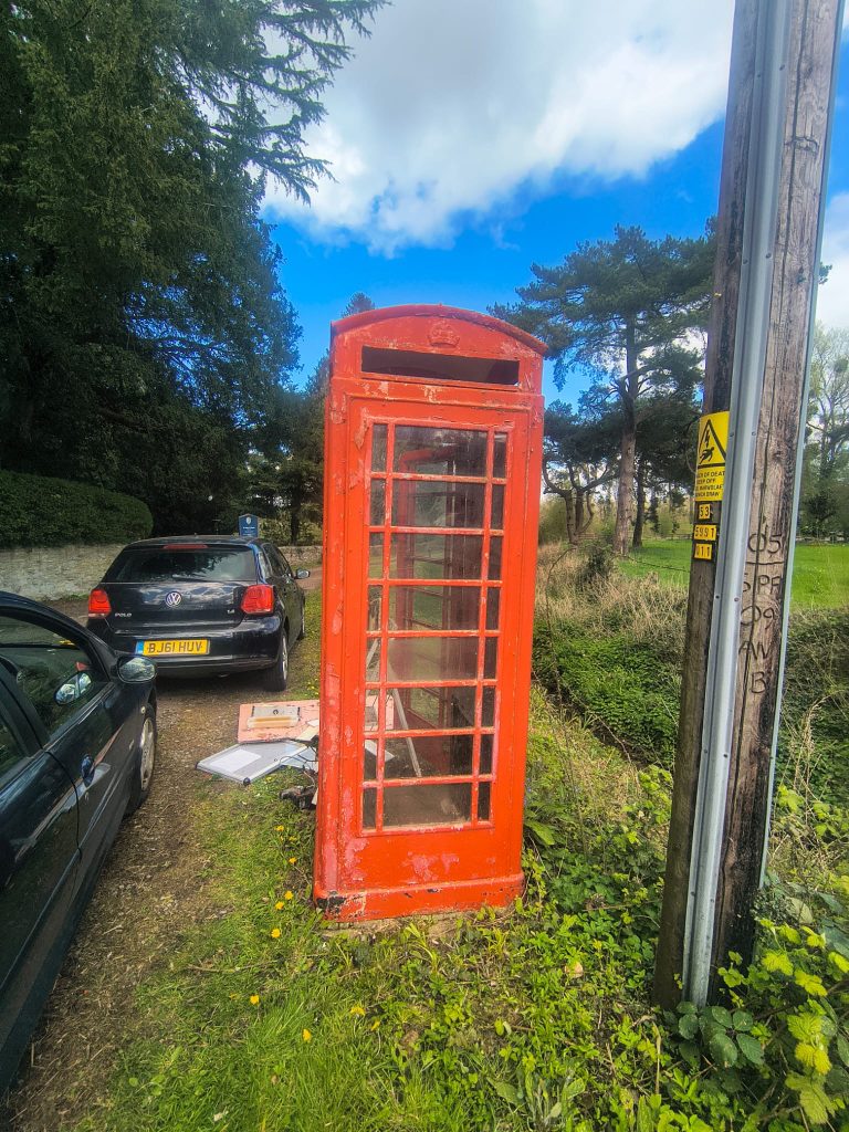 A K6 telephone box in Llanbadoc Island that is currently being refurbished
